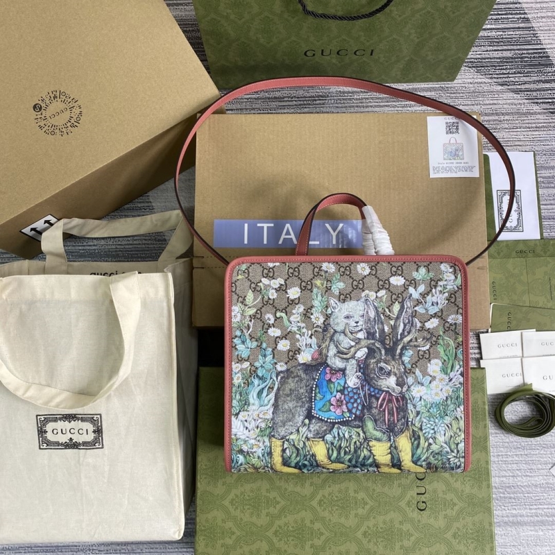 G*u*i shopping bags
